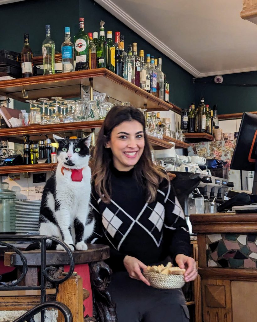 it's always lovely to find a bistro in Paris with a lovely smiley waitress and a cat. I hope this Review of The Tour Guys Montmartre Food Tour makes you smile too 