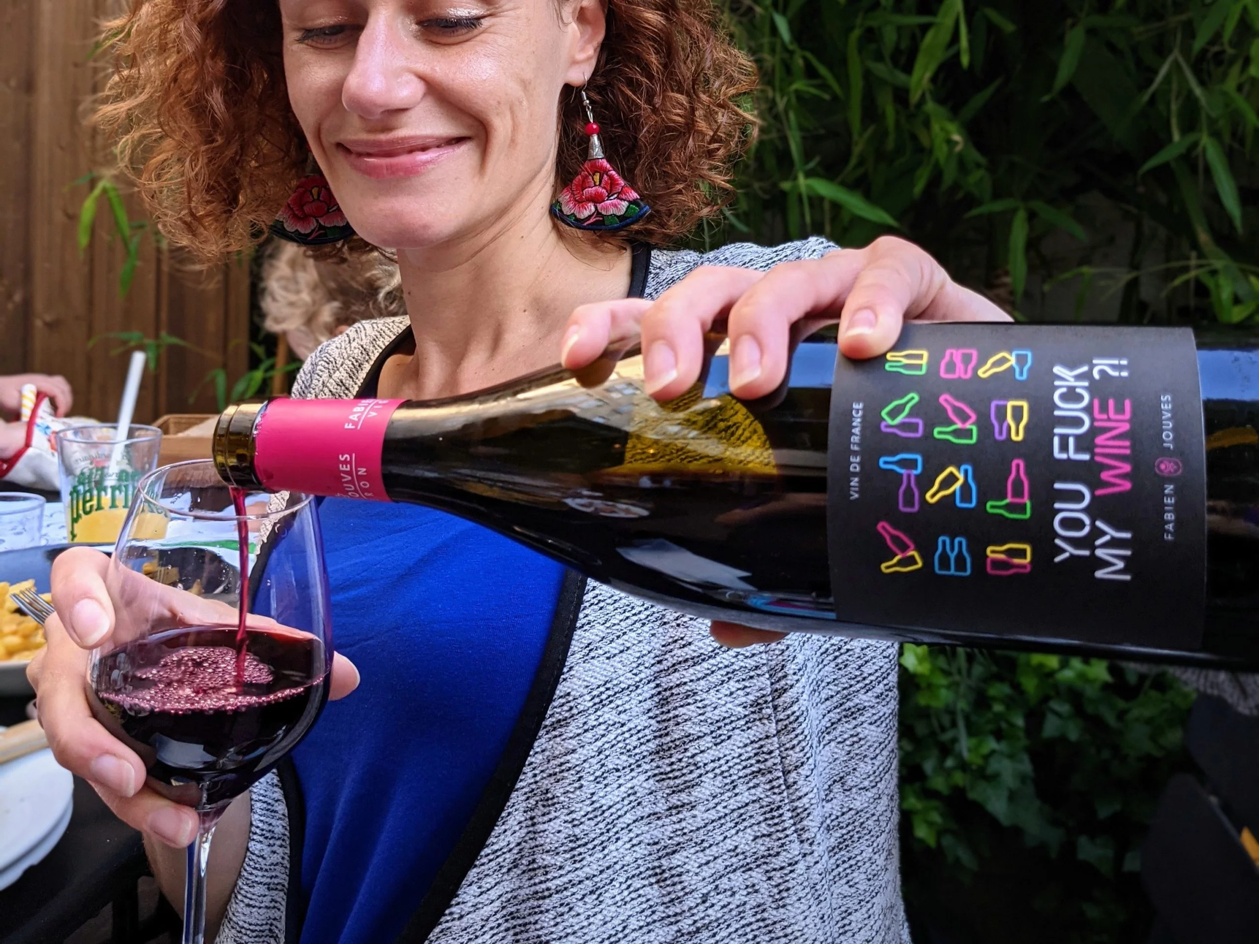 Wine-Paris a picture of someone helping themselves to wine as you may on one of our locally guided french food tours