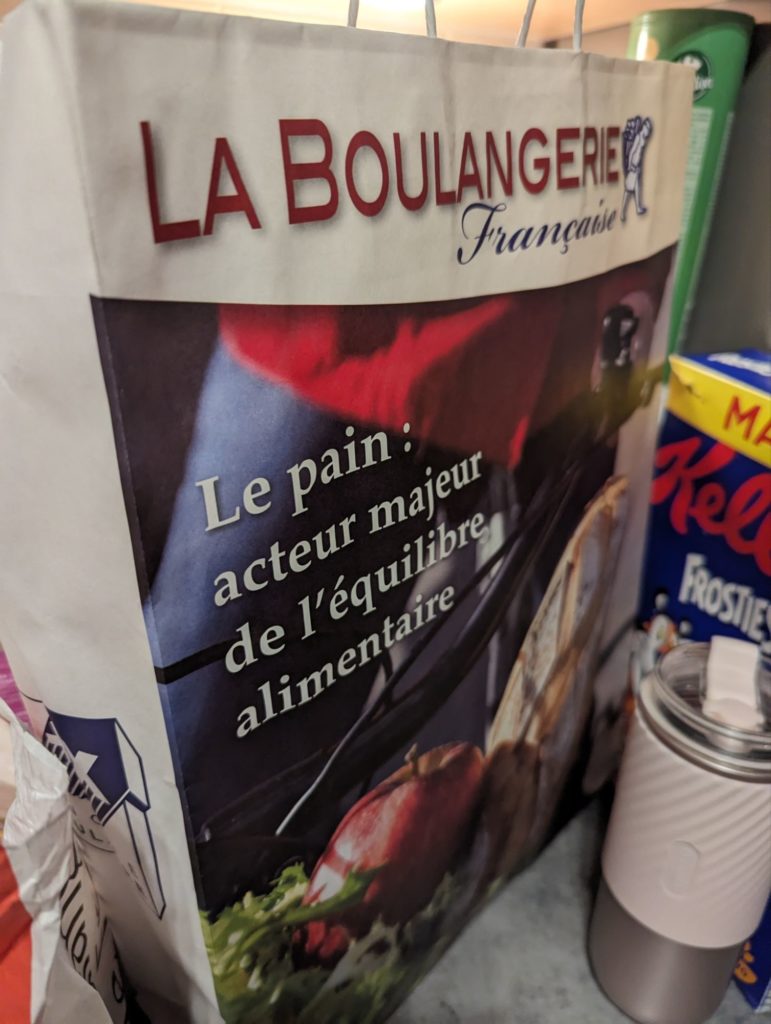a boulangerie de france bag full of goodies in my friends a pattisier kitchen who I visited the fete du pain and gave me a review