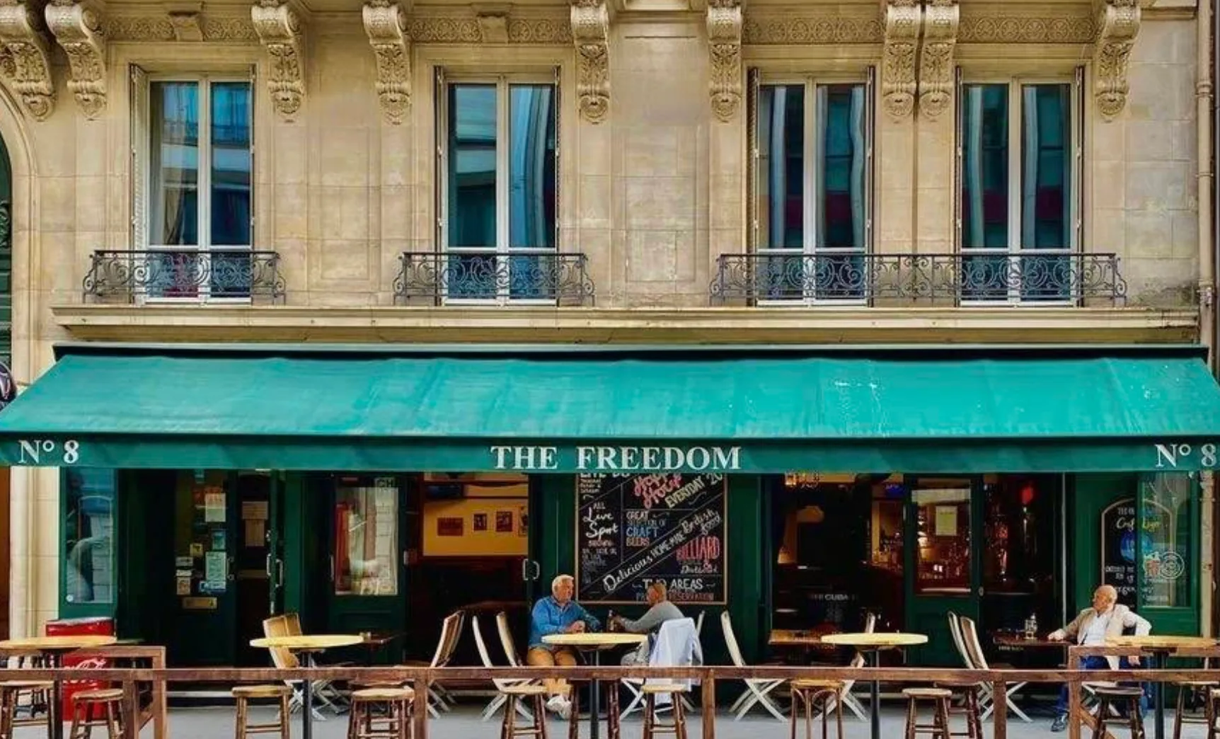 Screenshot 2025-03-11 at 14.54.55 Exterior view of The Freedom pub near Champs-Élysées, one of Paris's best British pubs featuring rare Adnams beer on tap.