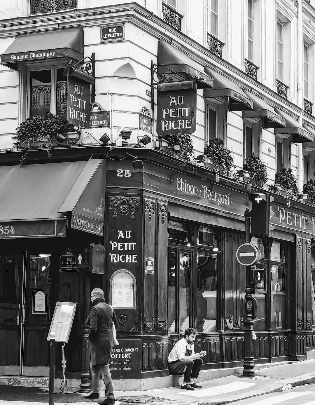 Traditional Paris bistro Au Petit Riche exterior in a non tourist area showing authentic local dining culture