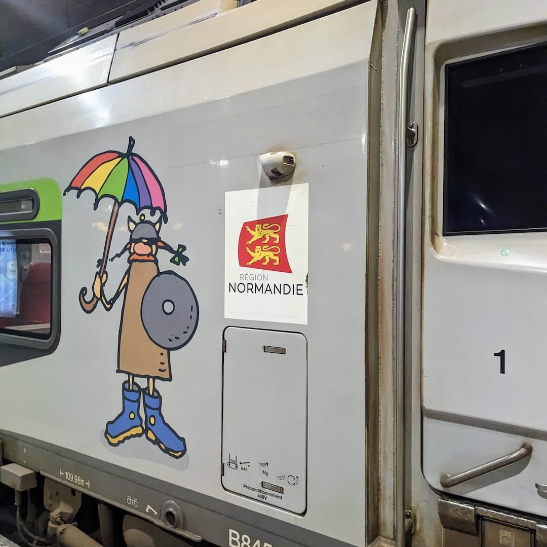 Train from Paris to Le Perche Normandy with regional Normandie logo