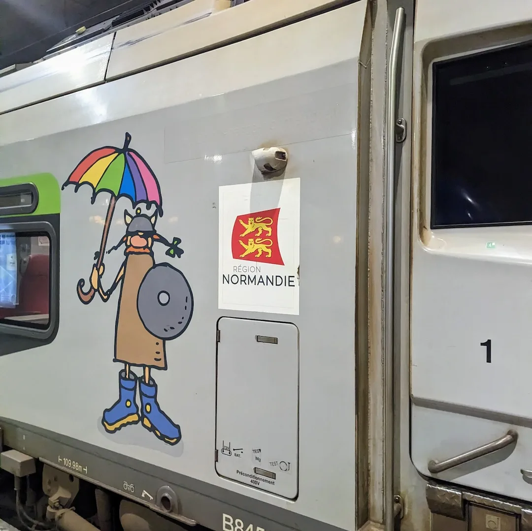 Train from Paris to Le Perche Normandy with regional Normandie logo